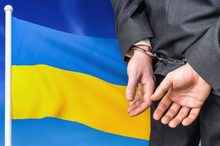 Prisons,And,Corruption,In,Ukraine.,Businessman,With,Handcuffs,On,National